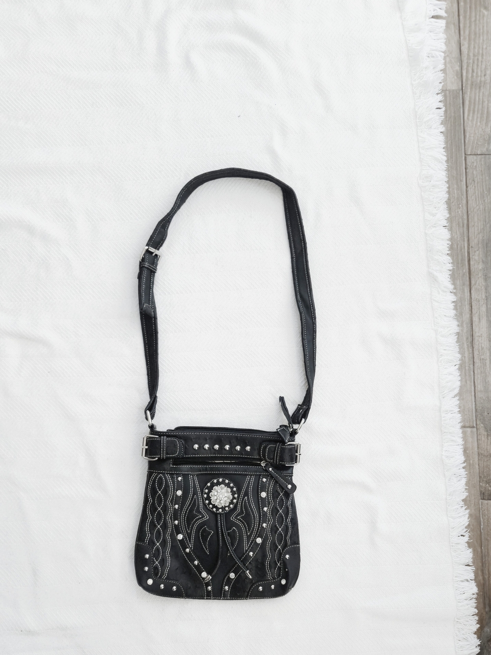 Studded Black Crossbody Bag with Decorative Concho